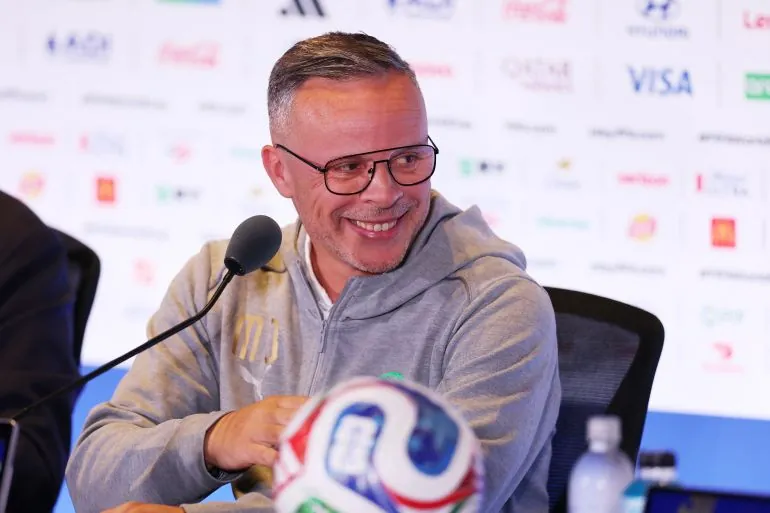 FOXBOROUGH, MASSACHUSETTS - JULY 08: Mohamed Ouahbi, Head Coach of Morocco, speaks to the media during a Morocco Press Conference at Boston Stadium on July 08, 2026 in Foxborough, Massachusetts. Molly Darlington/Getty Images/AFP (Photo by Molly Darlington / GETTY IMAGES NORTH AMERICA / Getty Images via AFP)