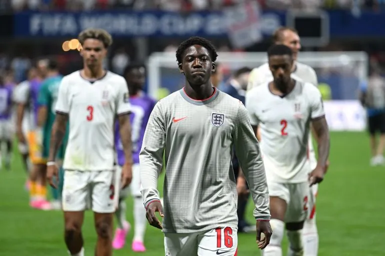 ATLANTA, GEORGIA - JULY 15: Kobbie Mainoo #16 of England reacts after the 1-2 loss during the FIFA World Cup 2026 Semi Final match between England and Argentina at Atlanta Stadium on July 15, 2026 in Atlanta, Georgia. Shaun Botterill/Getty Images/AFP (Photo by Shaun Botterill / GETTY IMAGES NORTH AMERICA / Getty Images via AFP)